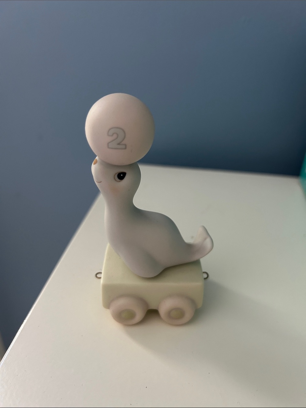 Precious Moments Gray Seal on Wheeled Base Figurine